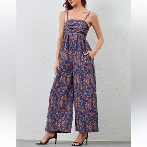 Anthropologie Hutch womans Floral Blue wide leg Jumpsuit size S